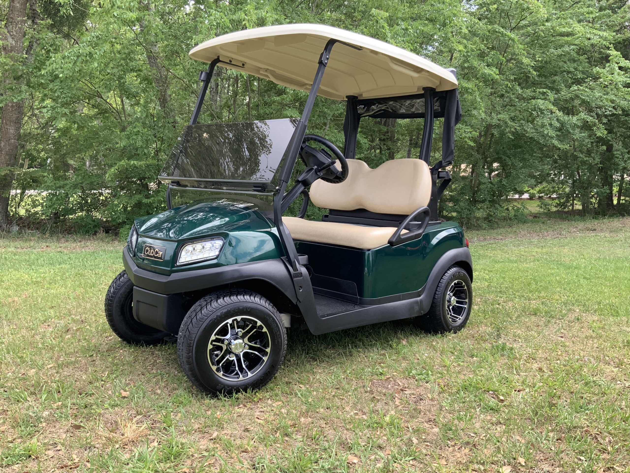 jade green tempo with standard beige seats and mercury rims 2 pass